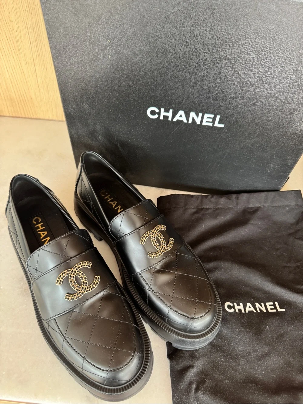 CHANEL Black Quilted Leather Loafers with Gold CC Hardware